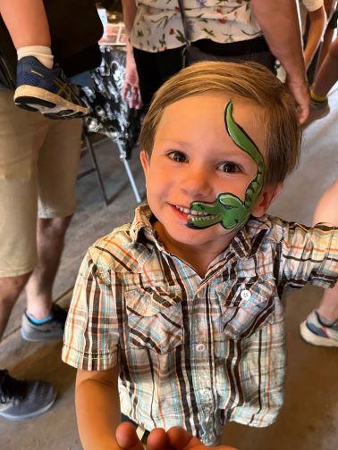 little boy with face painted